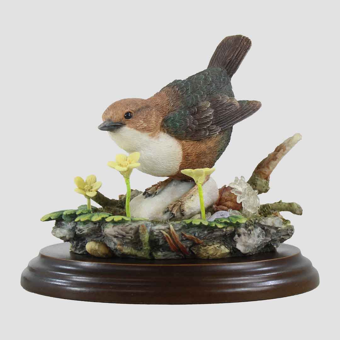 wren Bird figurine on a natural base with flowers and rocks. country artists