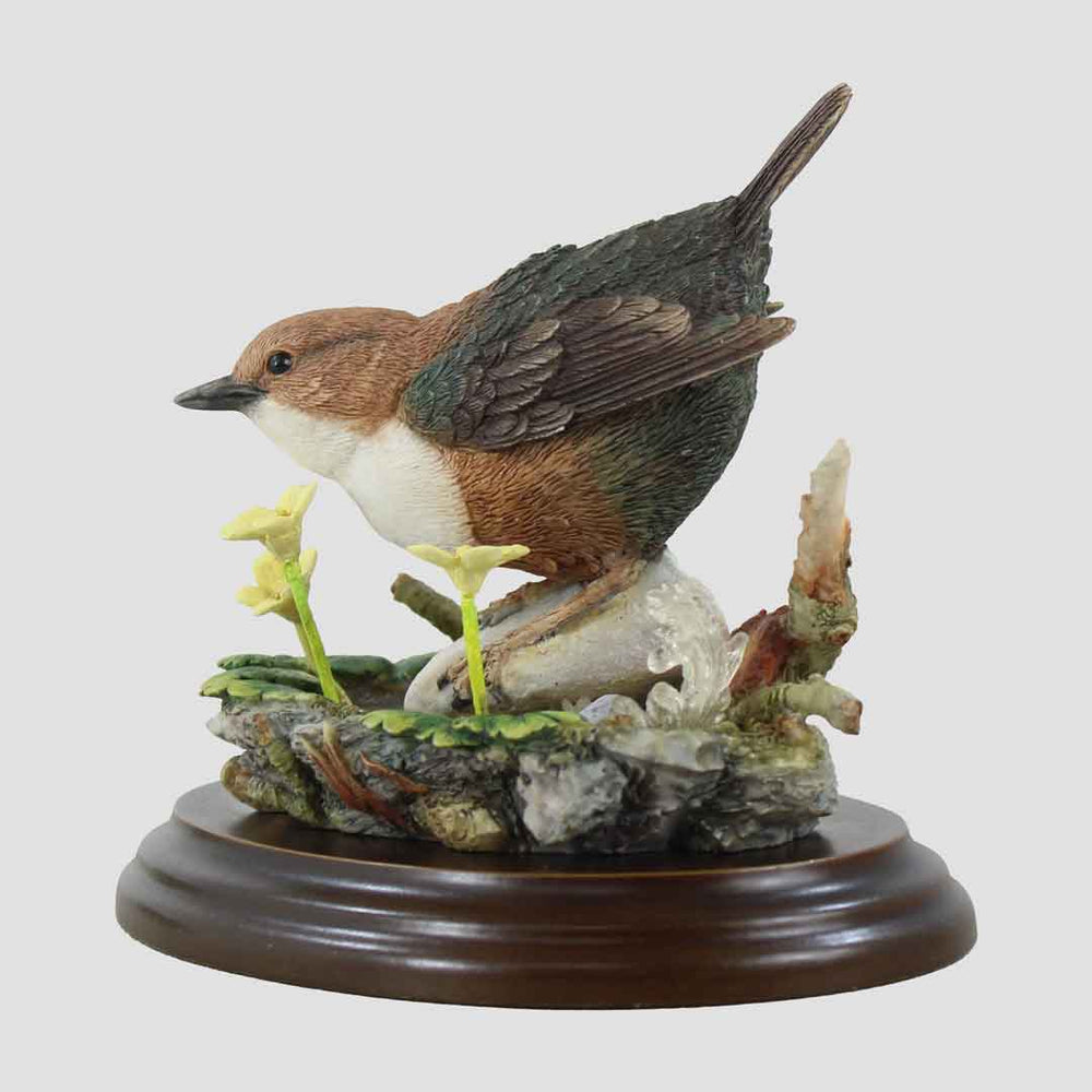 Bird figurine on a natural base
