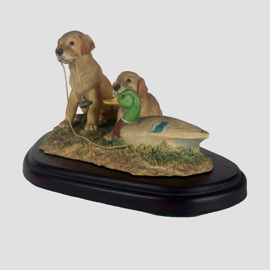 Labrador pup with decay duck Border Fine Arts Dog Model