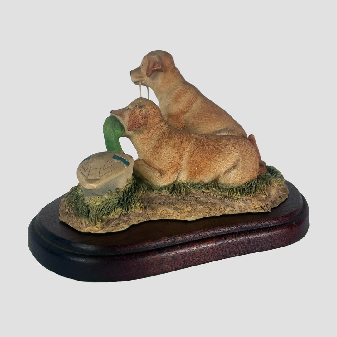 Labrador pup with decay duck Border Fine Arts Dog Model