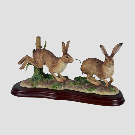 Running Hares By Border Fine Arts Studio
