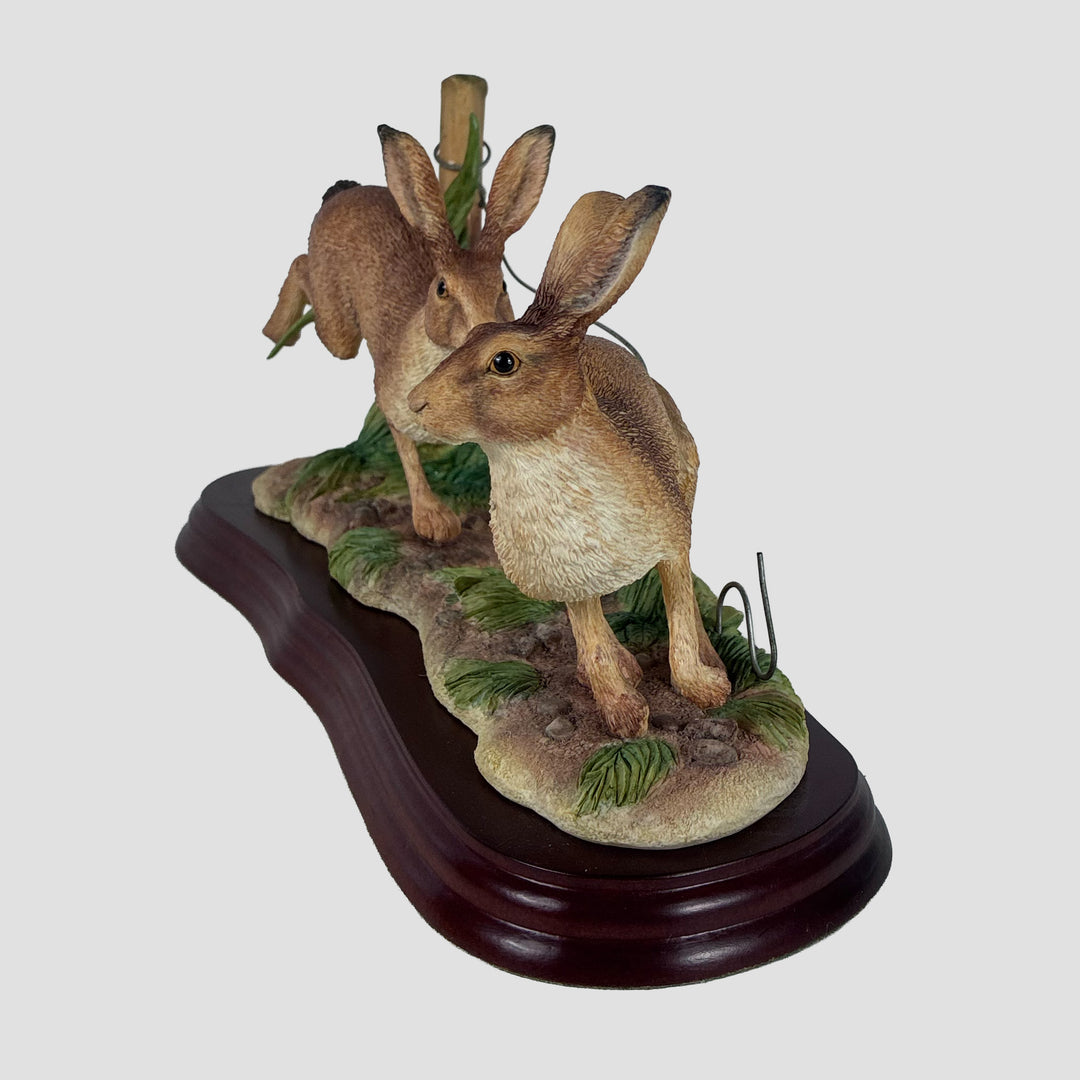 Running Hares By Border Fine Arts Studio