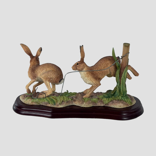 Running Hares By Border Fine Arts Studio