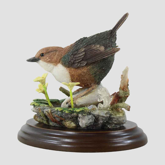 Bird figurine on a natural base