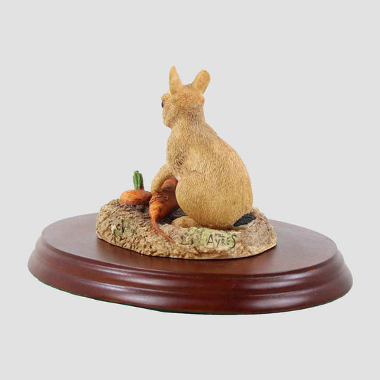 Rabbit With Carrots on Plinth Border Fine Arts