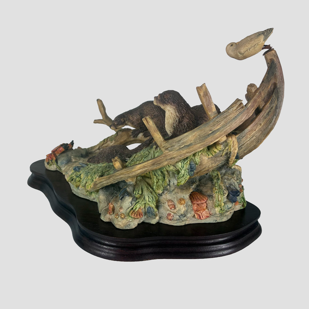 Otter and family in Boat Border Fine Arts