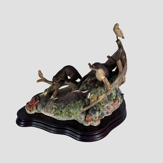 Otter and family in Boat Border Fine Arts