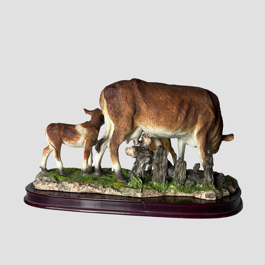 Cow and Calves by The Juliana Collection