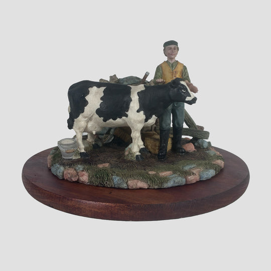 Dairy Cow and Farmer by Regency Fine Arts