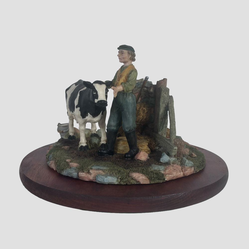 Dairy Cow and Farmer by Regency Fine Arts