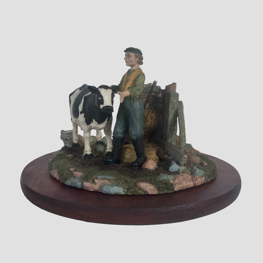 Dairy Cow and Farmer by Regency Fine Arts