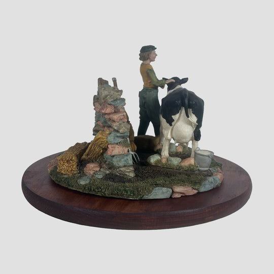 Dairy Cow and Farmer by Regency Fine Arts