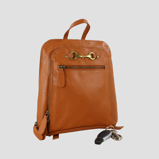 Brown leather backpack with gold zipper pull on a light gray background