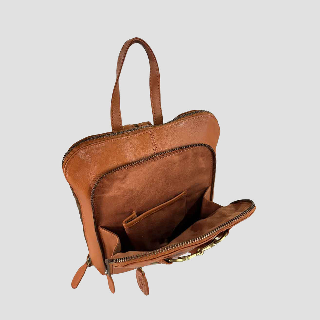 Brown leather backpack with open front pocket on a light gray background