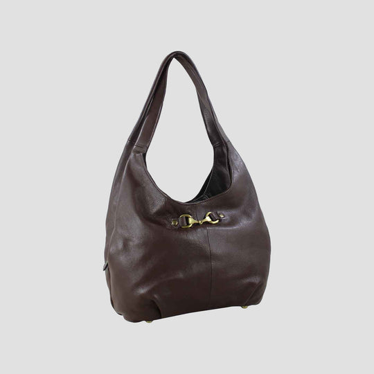 Brown leather handbag with a gold buckle on a light gray background