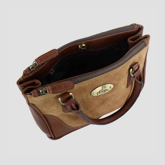 Brown leather handbag with visible brand logo on a light gray background