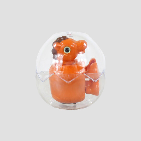 Wind Up Running Horse In Egg Shell Ball Orange